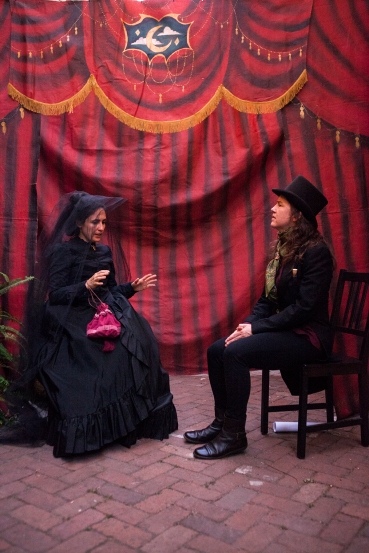 Josephine (Maria A. Leigh) consults with Doctor Vitae (Julie Douglas) in ELIXIR OF LIFE.